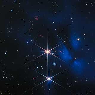 IC 348 Crop: Stars and faint outflows